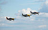 Three P-51 Mustangs in close formation over Duxford - geograph.org.uk - 2067012.jpg