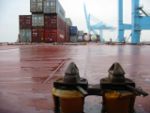 First level of twistlocks on a containership deck.jpg