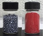 Two of the three allotropes of selenium: black and red. Grey selenium not shown