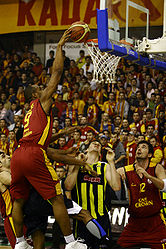 Owens (left), going for a dunk, while playing with Galatasaray, during the 2007-08 season.