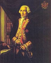 A three quarter length portrait of Admiral Langara, painted when he was younger.  He stands before a dark curtain partially pulled aside, revealing a bookcase.  His left hand rests on his sword.  His coat is a dark color with gold braiding on the lapels, and a red waistcoat is visible underneath.