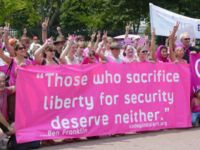 Code Pink activists demonstrate in front of the White House on July 4, 2006.