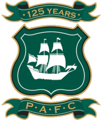The words "125 Years" and the intials "P.A.F.C" above and below a shield featured a ship called the Mayflower in full sail.