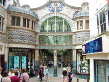 Elaborately decorated shopping mall with stained glass windows