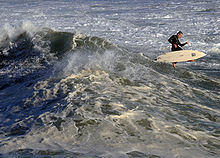 Photo of surfer catapulted from now-inverted board