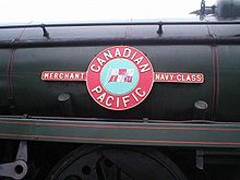 A Merchant Navy class enamelled metal nameplate mounted on the side of the locomotive boiler. The nameplate comprises a circle, containing a picture of the company flag of the shipping line, and two rectangles on either side containing the class name. In a larger circle bordering the central flag is the name of the shipping line.