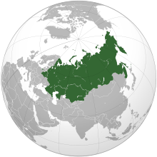 An orthographic projection of the world highlighting Belarus, Kazakhstan, and Russia (green).