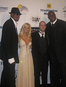 At a red carpet event for the Magic Johnson Foundation standing from left to right Dennis Rodman, Symone Prince, Darren Prince and Earvin Magic Johnson
