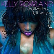 The Blue woman stands to the position hand and with a brown head. The Name of Perfomer is 'KELLY ROWLAND' and the name of single is 'motivation ft/ lil wayne'