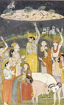  Krishna raising a mountain on a fingertip and providing shelter to his friends, the cowherds, from a thunderstorm.