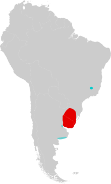 Map of South America marked by red and blue colors, with the red color extending over Uruguay and into Rio Grande do Sul, southern Brazil, and the blue color in southeastern Minas Gerais, eastern Brazil, and in two different areas in northern and southern Buenos Aires Province, eastern Argentina.
