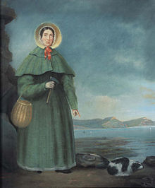portrait of woman with bonnet, rock hammer, and small dog