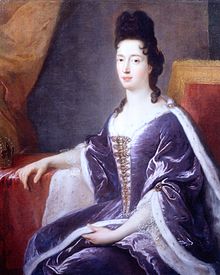 A pale, dark-eyed, black-haired lady wears a purple mantua fringed with ermine.