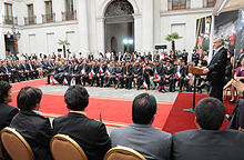 Color image of Los 33 miners attending a ceremony hosted by President Piñera at the Presidential Palace on 24 October 2010 after their rescue from the San Jose Mine