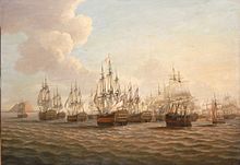 The painting focuses on the morning after the battle when British ships surrounded the fleeing Spanish fleet. The scene is bathed in a golden glow of early morning light. The British flagship is in the centre, indicated by the flag flying from the mainmast. She is at the head of a line of British ships, shown in the act of capturing the Spanish squadron in the middle centre. Land can be seen in the distance on the left.