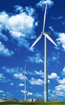 large white wind turbines in rural Minneota