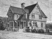 Engraving of a two-story house with gabled roof and Tudor accents.