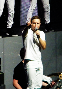 Colour image of Olly Murs singing