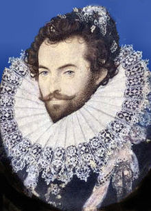A head-and-shoulders portrait of Sir Walter Raleigh.  He is wearing an extremely large ruff, and has his hair done up in curls. Underneath the ruff, he is wearing a black shirt.