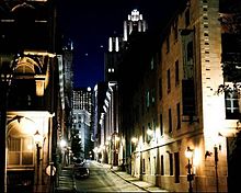 Narrow Montreal street at night