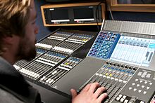 A WSU CFPCA student operates a switcher during a production.