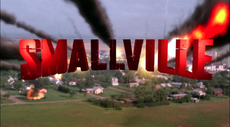 The word "SMALLVILLE" appears in red, block letters in front of a background of a small town as a meteor shower occurs.