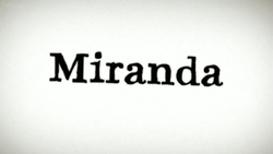 The text "Miranda" in a black, serif font, rotated slightly clockwise on a white background fading to grey in the corners.