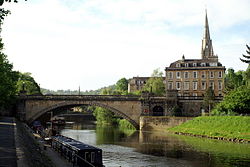 North Parade bridge, showing Number 14 and the spire of St John's church.