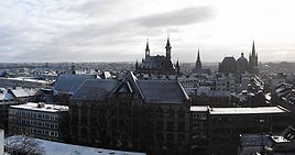panoramic view of Aachen, including Kaiser Karls Gymnasium (foreground), townhall (back center) and cathedral (back right)