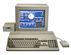 An Amiga 500 computer system, with 1084S RGB monitor and second A1010 floppy disk drive