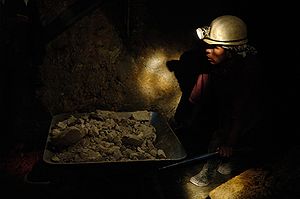 Miner in a gallery Potosi (pixinn.net).jpg