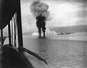 Smoke rises from two Japanese aircraft