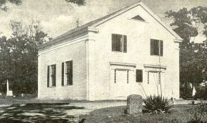 A 1905 view of the Old Indian Meeting House in Mashpee. Built in 1684 on the site of an earlier meetinghouse, the building has been used as a meetinghouse, church, and even a school. In 1717 the church, the occupant of the time, was moved from its original location to the place where it stands today. Later that century, a burial ground was started on the lands of the site. Burials still occur today in the cemetery. The meetinghouse is the oldest extant Native American church in the United States and the oldest church on Cape Cod.