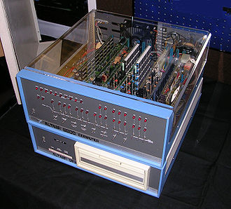 Altair computer with cover removed. The front panel has two rows of LEDs and two rows of switches.